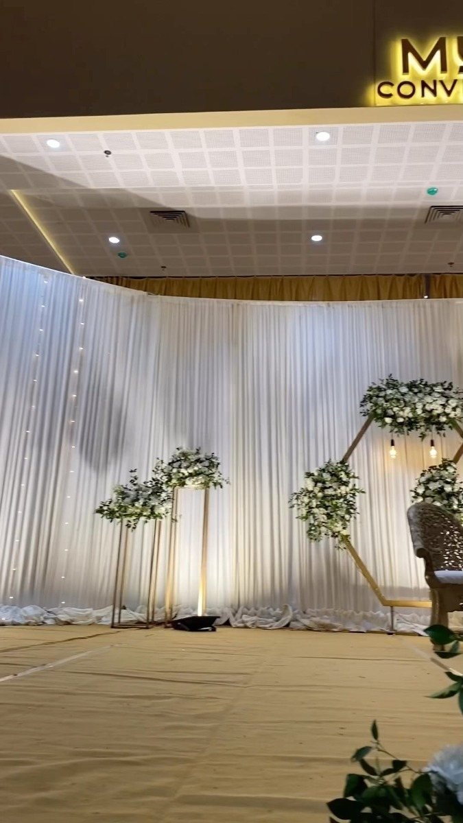 An Elinor Convention Centre wedding moment, golden-hour reception light