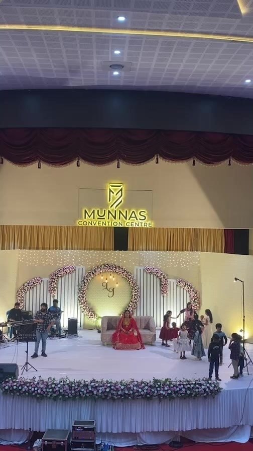 The grand hall at golden hour, set for a Thrissur wedding reception